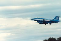 MM6833 @ EGQS - F-104S Starfighter of 5 Stormo, in 25th anniversary markings, on final approach to Lossiemouth in the Summer of 1989. - by Peter Nicholson