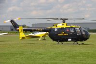 G-PASX @ EGCJ - MBB BO-105DBS-4. Air Ambulance on-call at Sherburn's Fly-in and Veteran Car Meet in 2004. - by Malcolm Clarke