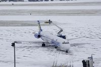 N863GA @ KPIA - Allegiant Airways (N863GA) de-icing prior to departure - by Thomas D Dittmer