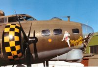G-BEDF @ EGQL - Nose art of B-17G Flying Fortress as Memphis Belle at the 1997 RAF Leuchars Airshow. - by Peter Nicholson