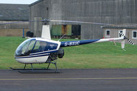 G-BXUC @ EGBJ - Robinson R22 at Staverton - by Terry Fletcher