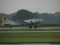 N390TH @ KTZR - Takeoff on a rainy day - by Kevin Kuhn