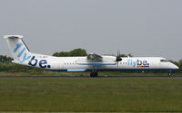 G-JECX @ EGCC - Arriving on Runway 05R. - by MikeP