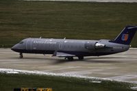 N928SW @ KPIA - United Express (N928SW) taxies to the runway for departure - by Thomas D Dittmer