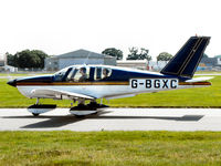 G-BGXC @ EGHH - Taken from the Flying Club - by planemad