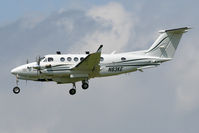 N83KE @ EGCC - Operated by L-3 Communications, this Beechcraft has a multitude of aerials & sensors fitted. - by MikeP