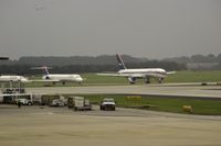 N601DL @ KATL - Delta Airlines (N601DL) begins takeoff roll - by Thomas D Dittmer