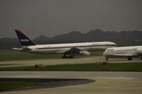 N601DL @ KATL - Delta Airlines (N601DL) rolling down the runway - by Thomas D Dittmer