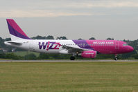 HA-LPT @ EGCC - Wizz Hour at Luton with a stream of departures. - by MikeP