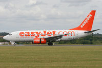 G-EZJS @ EGGW - Braking after touchdown on Runway 26. - by MikeP