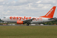 G-EZJW @ EGGW - Runway 26 arrival. - by MikeP