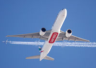 A6-EBX @ EGCC - Emirates '777 on finals for RW23R at MAN with United '777 N798UA (UAL935) passing behind. - by vickersfour