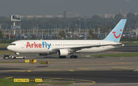 PH-AHX @ EHAM - Being towed to remote parking. - by MikeP