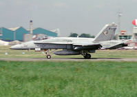 163503 @ EGCD - Arriving for the Woodford Air Show 1992. F/A-18A from US Navy VF-83 coded '302'. - by vickersfour