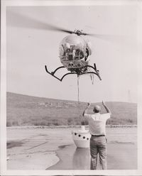N2248W @ 98L - Scanned from archives, new fire water bucket being tried out - by Helicopterfriend