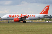 G-EZAA @ EGGW - Rolling down Runway 26. - by MikeP
