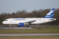 OH-LVH @ EGCC - Finnair A319 taxies for departure from Manchester - by Terry Fletcher