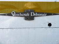 N330Z @ SZP - 1960 Beech 35-33A DEBONAIR, Continental IO-470-J 225 Hp, logo - by Doug Robertson