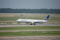 N66057 @ IAH - N66057 touchdown rwy 26L - by AJ Heiser