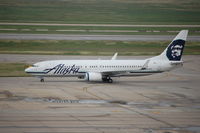 N597AS @ IAH - N597AS, the lone ASA arrival from SEA, taxiing to parking on txy NB