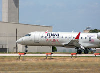 N8932C @ KAUS - NWAX touches down on 17L. - by Darryl Roach