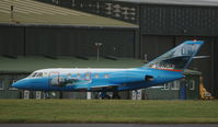 UR-NOA @ EGHH - FALCON 20 in for attention at Cobham Aviation Hurn. - by Uzzy