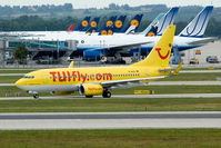 D-AHXI @ EDDM - yellow bird in front of the mostly white and blue SA-planes - by Robbie0102