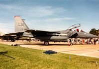 91-0313 @ MHZ - F-15E Eagle of 48th Fighter Wing with 3rd Air Force tail markings in the static park at the 1993 Mildenhall Air Fete. - by Peter Nicholson