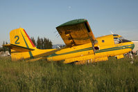 C-GWHK @ CYXX - Conair Grumman Tracker - by Andy Graf-VAP