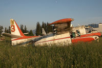 C-GWUO @ CYXX - Conair Grumman Tracker - by Andy Graf-VAP