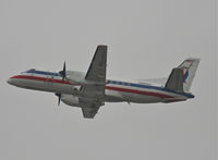 N901AE @ KLAX - American Eagle SAAB 340B, 25R departure KLAX. - by Mark Kalfas