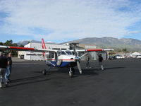 N609CP @ SZP - 2004 Gippsland Aeronautics GA-8 AIRVAN, ex-VH-UGR, Lycoming IO-540-K1AS 300 Hp for 2 minutes, 8 place with two seats removed for sensor equipment, operated by Civil Air Patrol at VNY, refueling. Note: Snow-capped 6,704' Hines Peak in the Topa Toipa Mntns. - by Doug Robertson