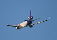 N610FE @ KLAX - FedEX MD-11F, 25L departure KLAX. - by Mark Kalfas