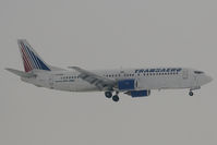 EI-DNM @ LOWW - Transaero 737-400 - by Andy Graf-VAP