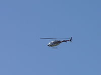N206SA @ POC - Crossing active runway for downwind leg to Brackett eastside helipad - by Helicopterfriend