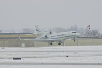 N12U @ CID - In the flare over the numbers on Runway 27 during snow shower
