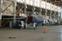 76-0063 - F15A Eagle under restoration in hanger 67 (with the Tomcat) - by jetjockey