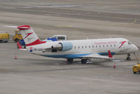 OE-LCQ @ VIE - Austrian arrows Canadair Regional Jet CRJ200LR