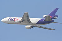 N398FE @ KLAX - FedEX MD-10-10F, 25L departure KLAX. - by Mark Kalfas