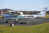 G-BHRN @ EGBO - Part of a busy aviation scene at Wolverhampton (Halfpenny Green) Airport on a crisp winters day - by Terry Fletcher