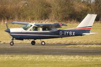 G-AYSX @ EGBO - Part of a busy aviation scene at Wolverhampton (Halfpenny Green) Airport on a crisp winters day - by Terry Fletcher