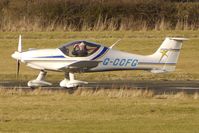 G-CCFG @ EGBO - Part of a busy aviation scene at Wolverhampton (Halfpenny Green) Airport on a crisp winters day - by Terry Fletcher