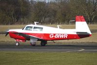 G-BIWR @ EGBO - Part of a busy aviation scene at Wolverhampton (Halfpenny Green) Airport on a crisp winters day - by Terry Fletcher