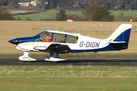 G-DIGN @ EGBO - Part of a busy aviation scene at Wolverhampton (Halfpenny Green) Airport on a crisp winters day - by Terry Fletcher