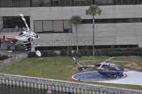 N60WJ @ 61FL - An agressive approach into Tampa General Hospital during Gasparilla 2010. - by Jasonbadler