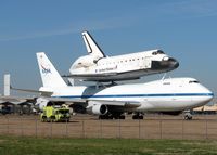 N911NA @ BAD - The crash truck looks pretty small next to this Giant! About to depart Barksdale Air Force Base with the Space Shuttle Endeavour for the final leg of the return trip to Florida. - by paulp