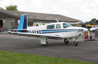 G-BKMB @ EGCJ - Mooney M-20J At Sherburn's May Fly-in in 2004.. - by Malcolm Clarke