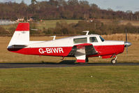 G-BIWR @ EGBO - Looking great in this new red colour scheme - this 1976 veteran Mooney heads for the 34 hold. - by MikeP