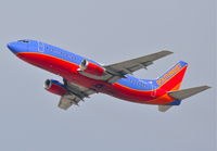 N635SW @ KLAX - Southwest Airlines Boeing 737-3H4, 25R departure KLAX. - by Mark Kalfas