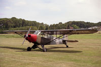 G-BIYR @ EGTH - Piper L-21B Super Cub (PA-18-135) at Old Warden Airfield, UK in 1990. - by Malcolm Clarke